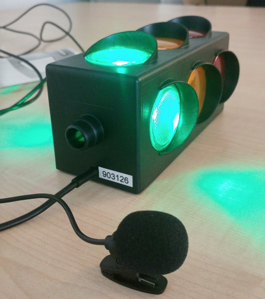 USB Traffic Light (green is on) and a microphone attached to a raspberry pi